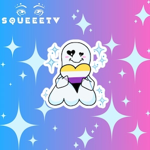 May include: A white ghost sticker holding a heart with yellow, white, purple, and black horizontal stripes. The ghost has heart-shaped eyes and pink cheeks. The background features light blue stars on a blue and pink gradient with the text SQUEEETV.