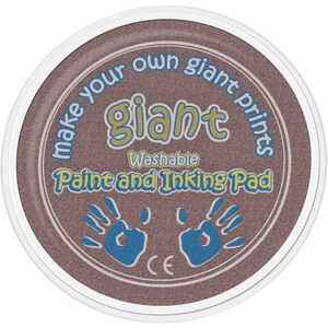 May include: A brown, round ink pad with a white border. The pad has the text "Make your own giant prints" and "Giant Washable Paint and Inking Pad" in yellow letters. The pad also has a blue handprint graphic with the CE mark.