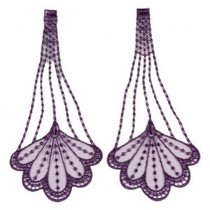 May include: Two matching purple lace appliques. Each applique features a fan-shaped design with beaded strands and a scalloped edge. The appliques are symmetrical and appear to be made of delicate lace.