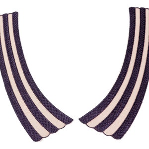 May include: A pair of dark purple and cream striped fabric collar pieces with scalloped edges.