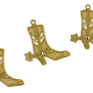 May include: Three gold-colored cowboy boot charms with a rhinestone embellishment and a spur detail.
