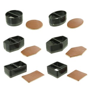 以下が含まれることがあります： 丸、楕円、長方形など、さまざまな形状の黒いプラスチック容器の詰め合わせ。それぞれに茶色の革のようなパッドが組み合わされています。容器には仕切りがあります。