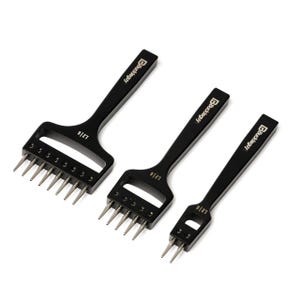 May include: Three black leather punch tools with gold lettering that reads "Blackberry" and "12/16".