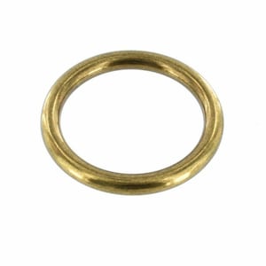May include: A gold-colored metal ring, also known as a jump ring, is a common hardware item used in jewelry making.