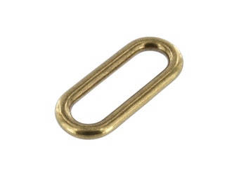 May include: A gold-toned oval metal ring with a smooth finish. The ring has a large opening in the center.