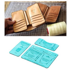 May include: Handmade leather wallet in natural tan color, showcasing multiple card slots and a bi-fold design. Includes a spool of cream-colored thread and blue acrylic wallet templates with text for leathercrafting projects.