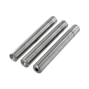 May include: Three silver metal tubes with rounded ends. The tubes are different lengths and have a smooth, polished finish.