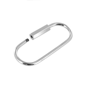 May include: A silver oval-shaped key ring with a screw-on hexagonal connector.