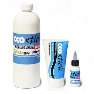 May include: Three bottles of Eco Stick water-based adhesive. The largest bottle is white with a blue label that says "Eco Stick Water Based Adhesive 1804 Buckleguy intercom". The medium bottle is white with a blue label that says "Eco Stick Adesivo base acqua WB Adhesive intercom". The smallest bottle is clear with a black cap and a white label that says "Eco Stick Adesive gay intercom".