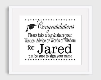 May include: A black and white sign with a graduation cap graphic and the text "Congratulations Please take a tag & share your Wishes, Advice or Words of Wisdom for Jared p.s. be sure to sign your name"