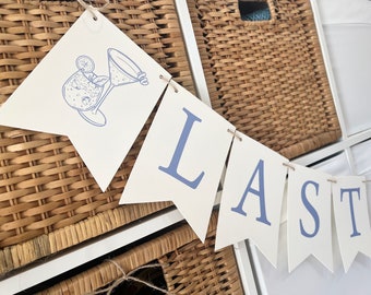 PRINTED Last Toast on the Coast Banner, or pick your own letters. Cocktail Pennants automatically included in all-print is a cornflower blue