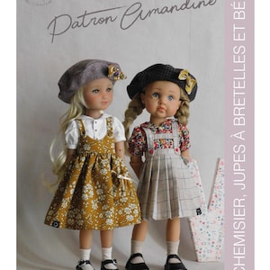 May include: Two dolls dressed in handmade outfits, including dresses, berets, and Mary Jane shoes. The doll on the left wears a mustard-coloured dress with white floral print. The doll on the right wears a plaid skirt. The image includes text that reads "Patron Amandine".