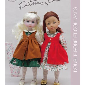 May include: A sewing pattern for a double dress and tights for dolls. The pattern is called "Faline" and is designed for dolls with a similar body type to the two dolls shown in the image. The dolls are wearing the finished garments, one in a brown dress and the other in a red dress. Both dolls are wearing white tights with black stripes.