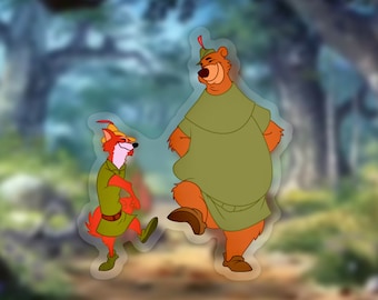 Puede incluir: Una pegatina con Robin Hood y Little John de la película animada de Disney, Robin Hood. La pegatina es transparente y muestra a los personajes en un entorno de bosque.