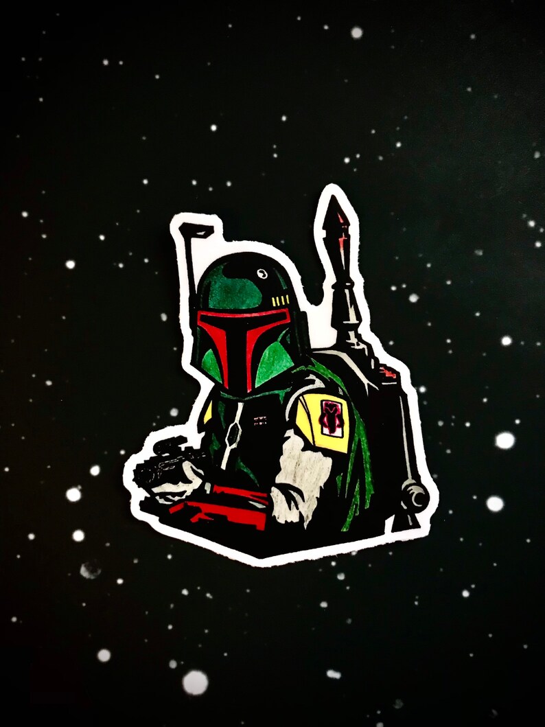 May include: A black and white illustration of a Star Wars character, Boba Fett, wearing a green and red helmet and holding a blaster. The illustration is set against a black background with white stars.