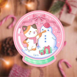 Autocollant holographique Holiday Snow Globe Snow Man Kitty