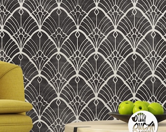 May include: A black and white geometric pattern wallpaper with a white and black art deco design. A yellow chair and a wooden table with green apples are in the foreground.