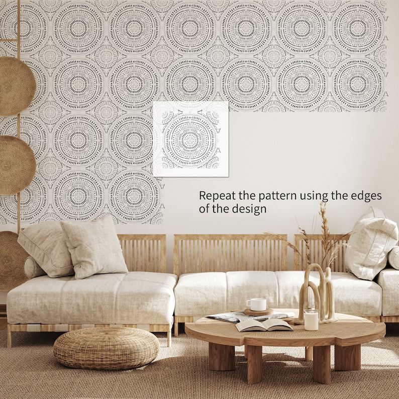 May include: A living room interior with a light beige sofa, a wooden coffee table, and a woven rug. The wall is decorated with a black and white geometric wallpaper pattern. The text "Repeat the pattern using the edges of the design" is visible on the wall.