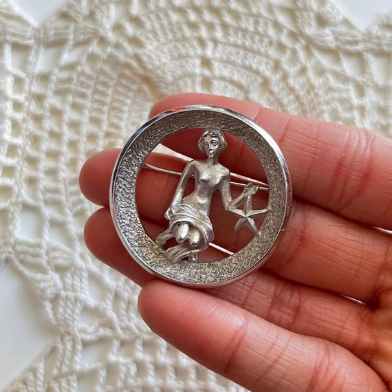 Crown Trifari Virgo Brooch Silver Tone