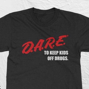 DARE Vintage Shirt With The 80s or 90s clothing retro shirt vibe. Instant classic. Dare t-shirt Unisex in 2 styles Fast Free Shipping