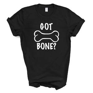 May include: Black t-shirt with white text that reads "GOT BONE?" and a white outline of a bone.