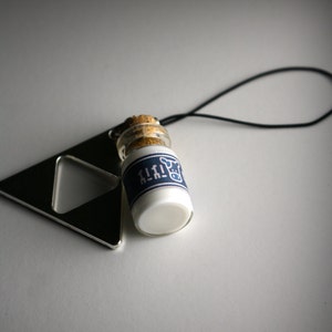 Legend of Zelda Lon Lon Milk and Triforce cellphone charm