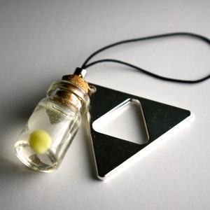 Legend of Zelda Fairy (they glow in the dark) and Triforce cellphone charm