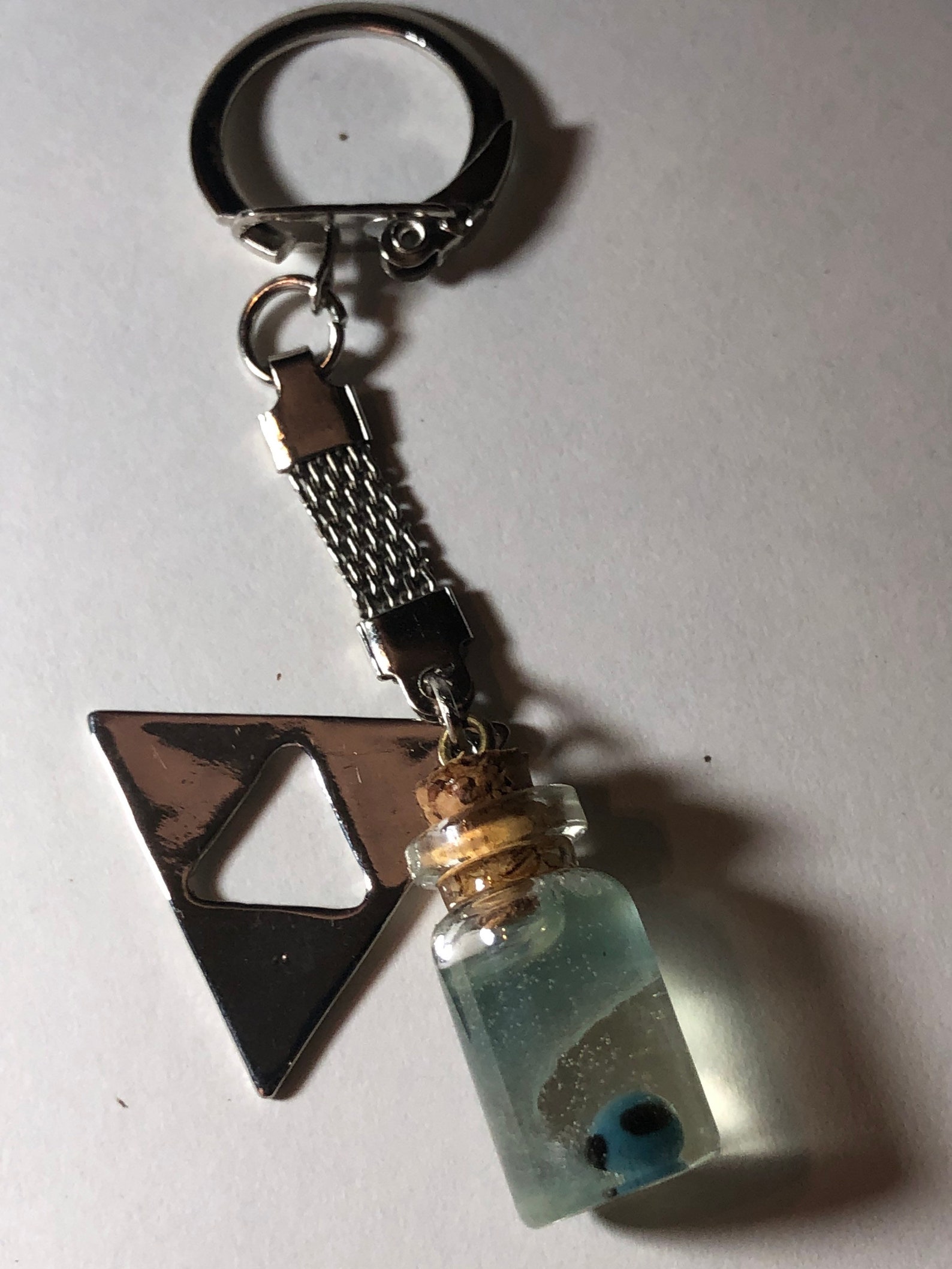 Poe in a Bottle With Triforce Keychain glows in the Dark Etsy