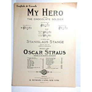 Puede incluir: Partitura musical titulada "My Hero" de "The Chocolate Soldier". La portada presenta el título, notación musical y los nombres del compositor Oscar Straus y el letrista Stanislaus Stange. El texto está en inglés y francés.