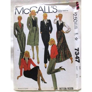 May include: McCall's sewing pattern featuring illustrations of women's business attire. The pattern includes designs for suits, skirts, and pantsuits in various colors. The pattern number is 7347, with a bust size of 31 1/2 inches.