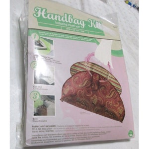May include: Handbag Kit featuring InnerFuse, a fusible fabric for crafting. The kit includes instructions for cutting, sewing, and ironing the fabric. The image shows a finished handbag with a paisley pattern.