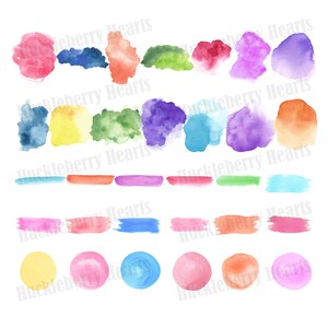 May include: A set of watercolor paint swatches in various colors, including pink, blue, green, yellow, and orange. The swatches are in different shapes, including circles, squares, and rectangles. The swatches are arranged in rows and columns on a white background.