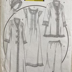 May include: Butterick B5061 sewing pattern featuring a nightgown, robe, pants, and cap. The pattern is designed by Rachel Wallis and includes a size range of Xsm-Med. The package has a vintage aesthetic with detailed illustrations of the garments.