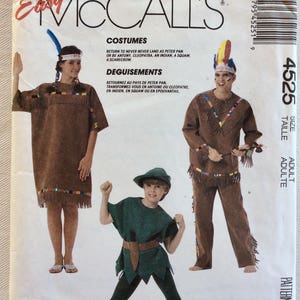 May include: McCall's costume pattern for adult and child costumes. The pattern includes instructions for Peter Pan, an Indian, Cleopatra, and a scarecrow. The package features images of the costumes.