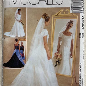 May include: McCall's sewing pattern featuring three bridal gown designs. The main image shows a bride in a white gown with a veil, standing in front of a mirror. The pattern includes sizes 0-12.