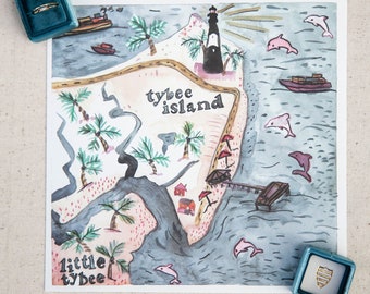 May include: A watercolor illustration of Tybee Island, Georgia, with a lighthouse, palm trees, and dolphins. The words "Tybee Island" and "Little Tybee" are written on the map. Two teal blue ring boxes are on either side of the map.
