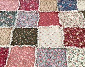 Trapunta a raglay in stile country con motivo floreale