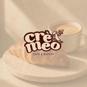 Cremeo Cafe and Bakery custom logo design — retro bubbly dark brown wordmark with illustrated barista character mascot on a warm cream and croissant background. Cafe brand logo by 90Designs.