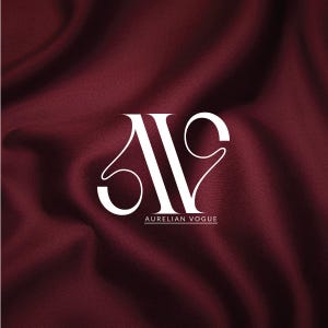 Aurelian Vogue custom logo design — intertwined AV serif monogram in white on deep burgundy silk fabric background. High-end fashion brand identity by 90Designs.