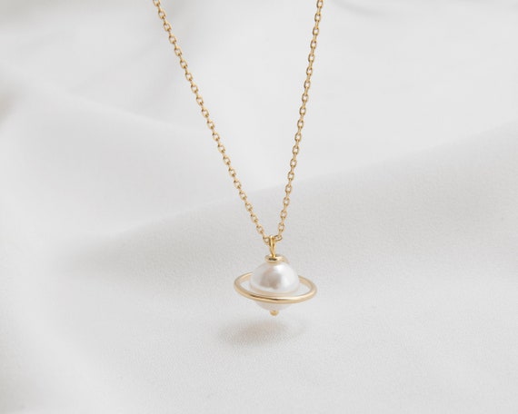 XIJIN Rhinestone Saturn Faux Pearl Necklace for Women Pearl Collar Pendant  Gold Saturn Necklace Planet Pearl Beaded Chain Choker, Metal, Cubic  Zirconia price in Saudi Arabia | Amazon Saudi Arabia | kanbkam