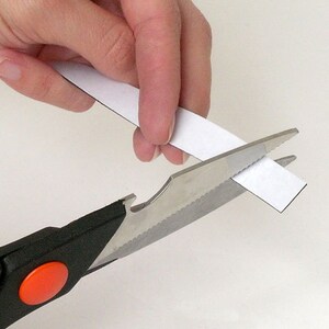 Roll of magnetic tape with peel and stick backing, ideal for 5th grade science experiments and classroom projects