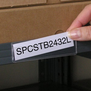 May include: A clear plastic label holder with a white label that says "SPCSTB2432L".