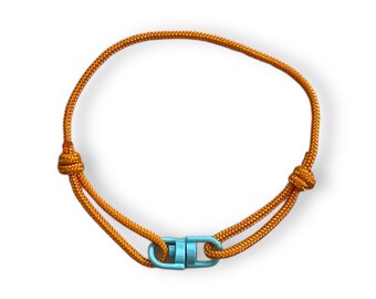 Orange Paracord Bracelet: Minimalist Unisex Style with Blue Connector