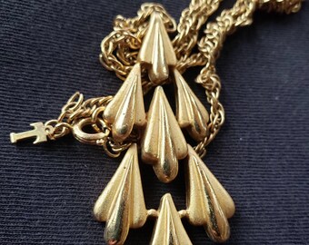 Signed Trifari Brushed and Shiny Gold Tone Articulated Pendant with 30 inch Chain