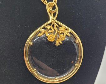 Vintage Gold Tone Rose Framed Plastic Magnifying Pendant on 28-inch Chain