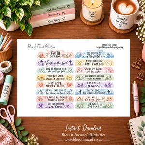 May include: A printable sheet of religious bible tabs featuring watercolour floral designs and inspirational quotes like Faith Over Fear, The Lord Is My Strength, and Amazing Grace, arranged in two columns on a white background with text.