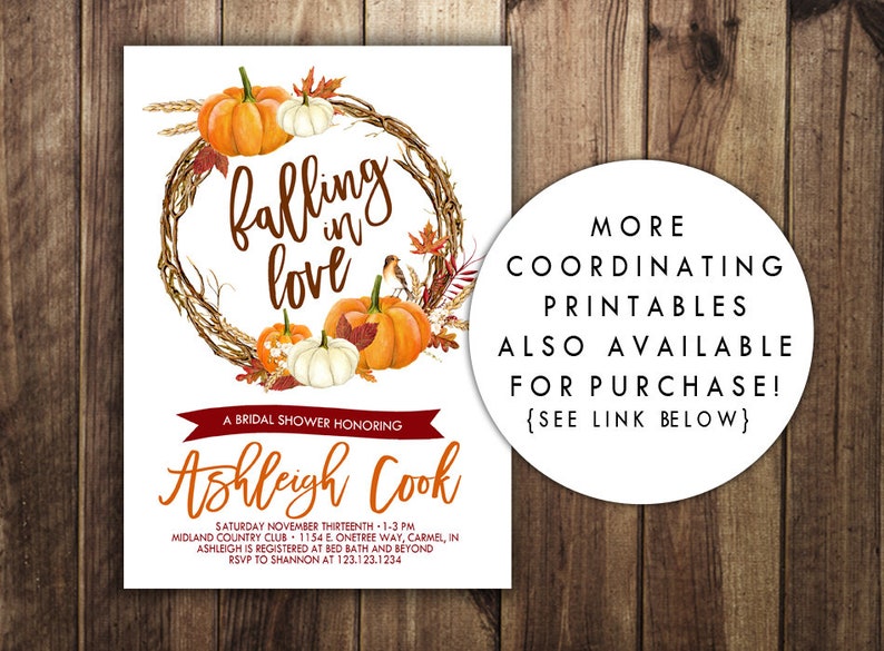 May include: A bridal shower invitation with a fall theme. The invitation features a wreath of fall leaves and pumpkins with the text "falling in love". The invitation also includes the bride's name, the date, time, and location of the shower.