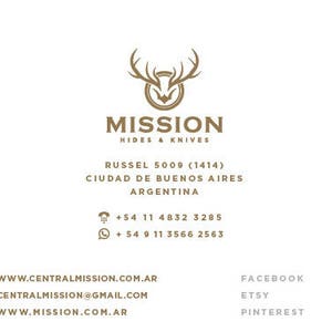 May include: A business card for Mission Hides & Knives, a company that sells hides and knives. The card features a logo of a deer head with antlers, the company name, and contact information. The card also includes the company's website address, email address, and social media handles.
