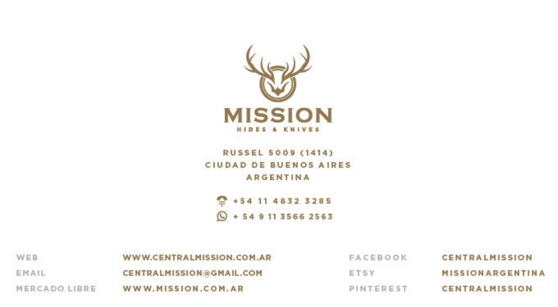 May include: A business card for Mission Hides & Knives, a company that sells hides and knives. The card features a logo of a deer head with antlers, the company name, and contact information. The card also includes the company's website address, email address, and social media handles.