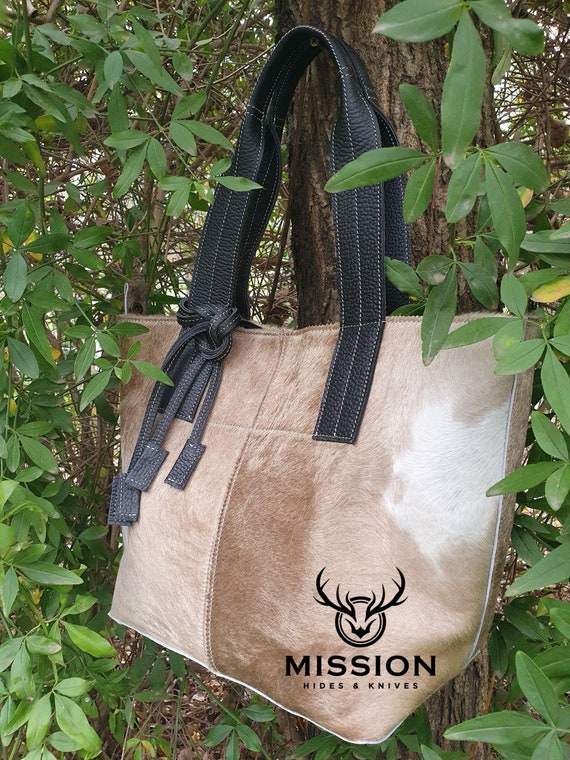 Etsy cowhide purse sale